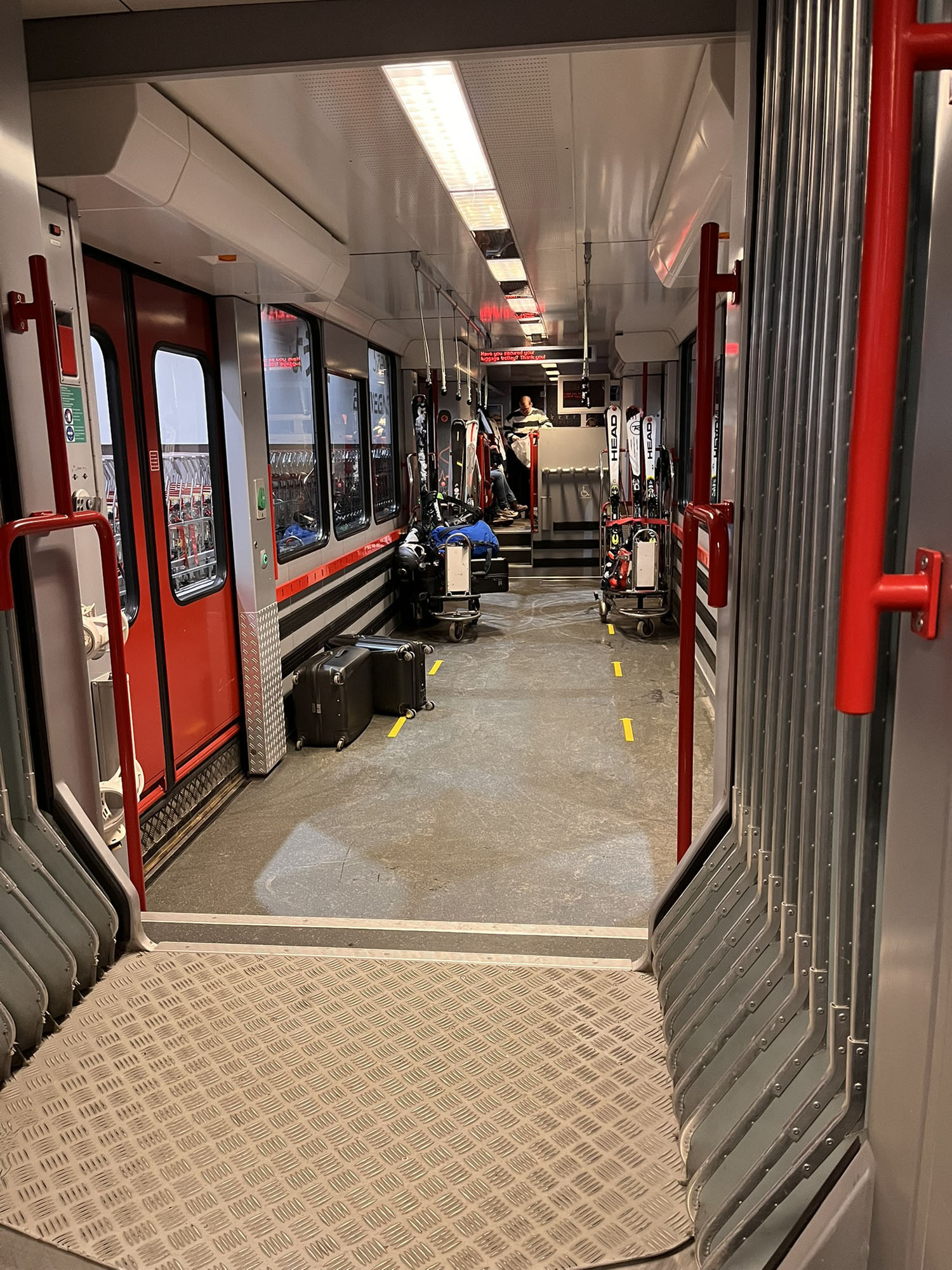 The inside of the shuttle has ample room for skiers and their equipment.